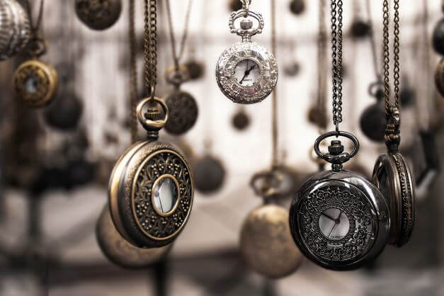 Silver pocket watches hanging
